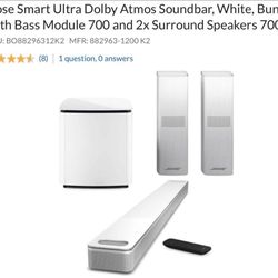 White Bose 700 soundbar, subwoofer and surround sound bundle