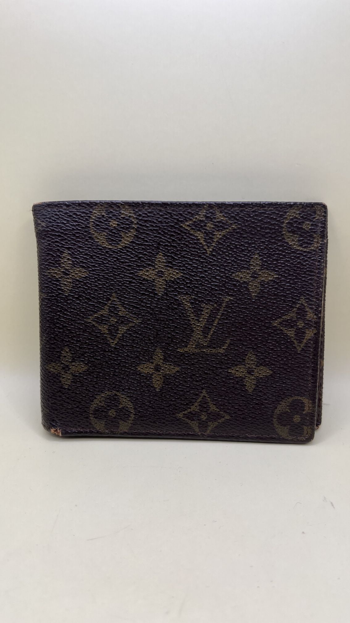 Vinatge Authentic Louis Vuitton Louis vuitton monogram bifold wallet See Details