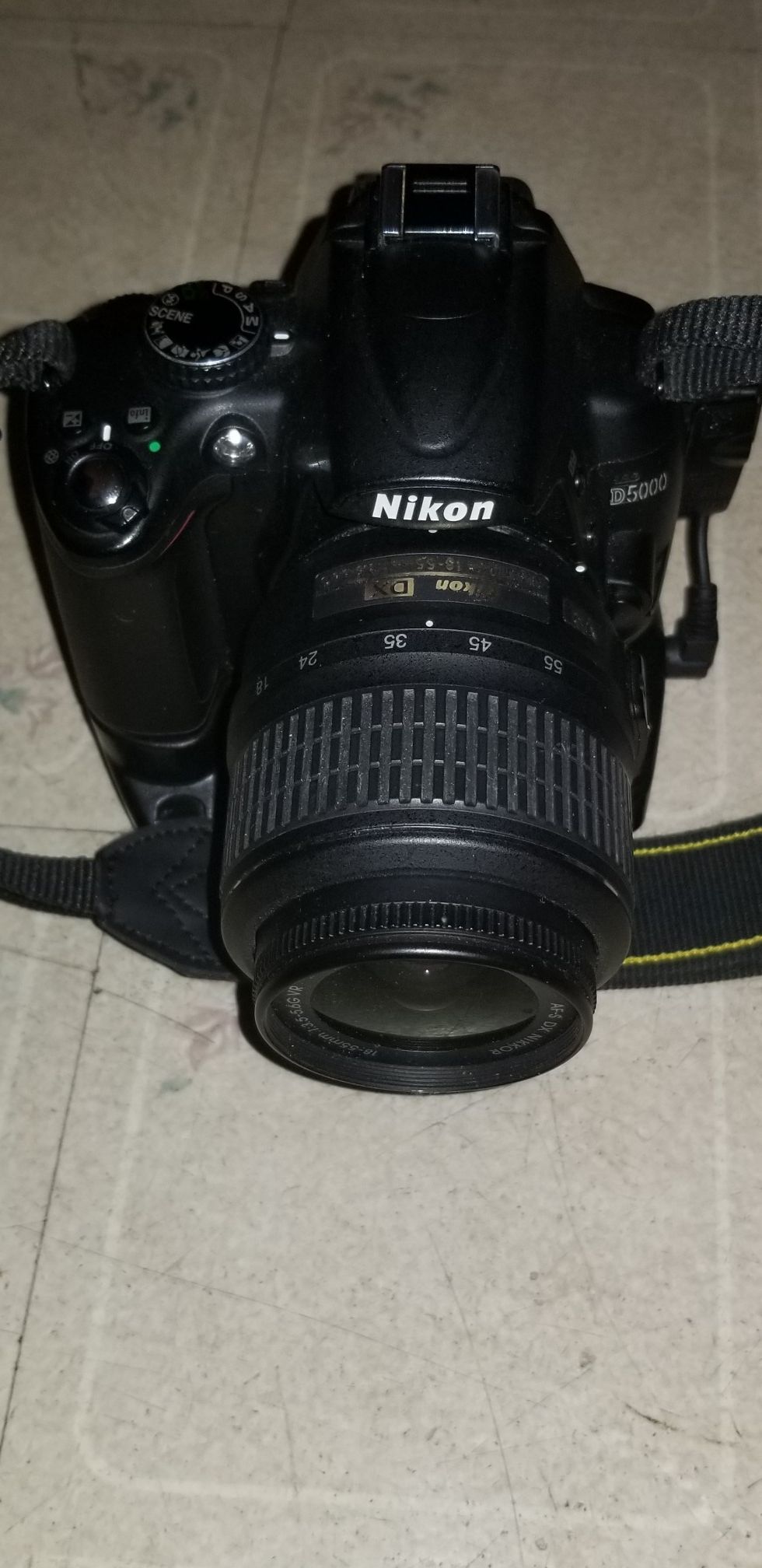 NIKON D5000 / Nikon DX 18 - 55mm 1:3.5 - 5.6G lens also battery grip