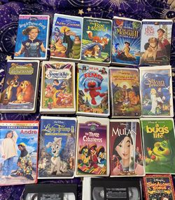 VHS movies 18 total, some Disney,
