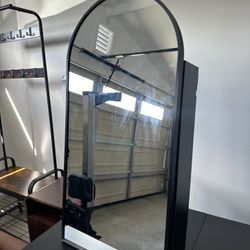 Black Arched Medicine Cabinet with Mirror with Power Outlets.