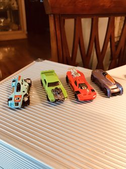 (4) 1/64 Scale Hot Wheels, Rivited, monoposto, spine buster and med- evil