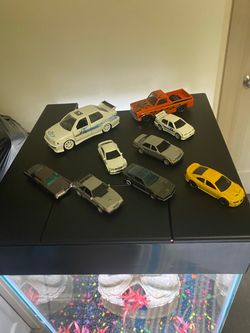 2 xl cars and 7 hot wheels mainline