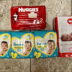 Size 1 and 2 Pampers and Huggies Diapers