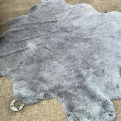 A Beautiful, Nice Shape, Grey Rug, Very Soft, Good Quality Item ( 64” X 64”) ( NO SHIPPING) The Back Is A Little Duty From Been In The She’d