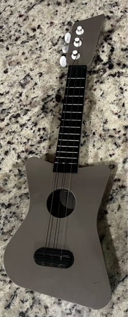 3 string ukulele/guitar