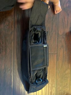 Parent's Choice deluxe black stroller organizer features dual insulated cup holders and a central storage pouch with a mesh pocket