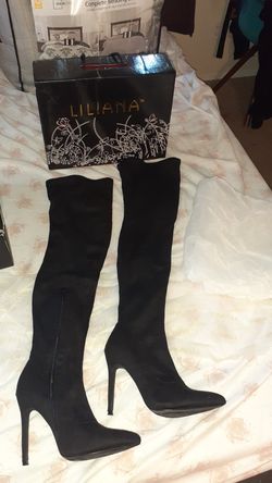 Black suede thigh-high boots