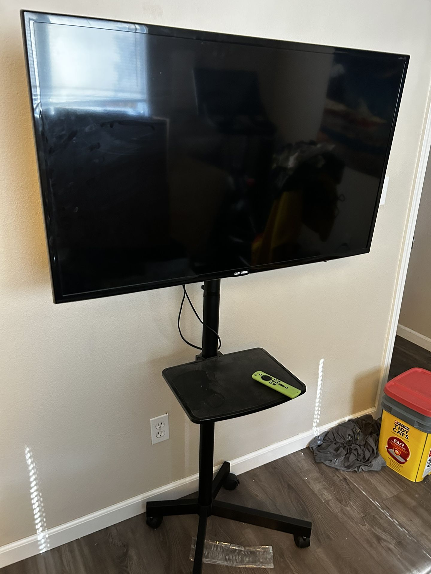 40" Samsung TV with Rolling Stand And Fire Stick