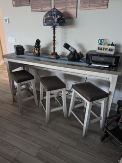 Buffet table with 3 bar stools for sale