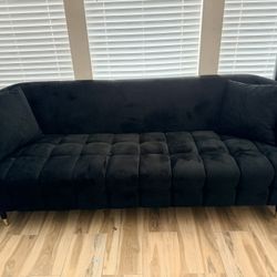 Black Tufted Sofa