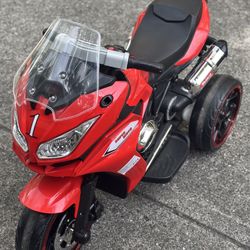 Kids Electric Motorcycle, Ages 3 -6, Music, Sounds, Twinkling Wheels By TAMCO Electric Ride on Toy,12 V Kids Motorcycle (RED)