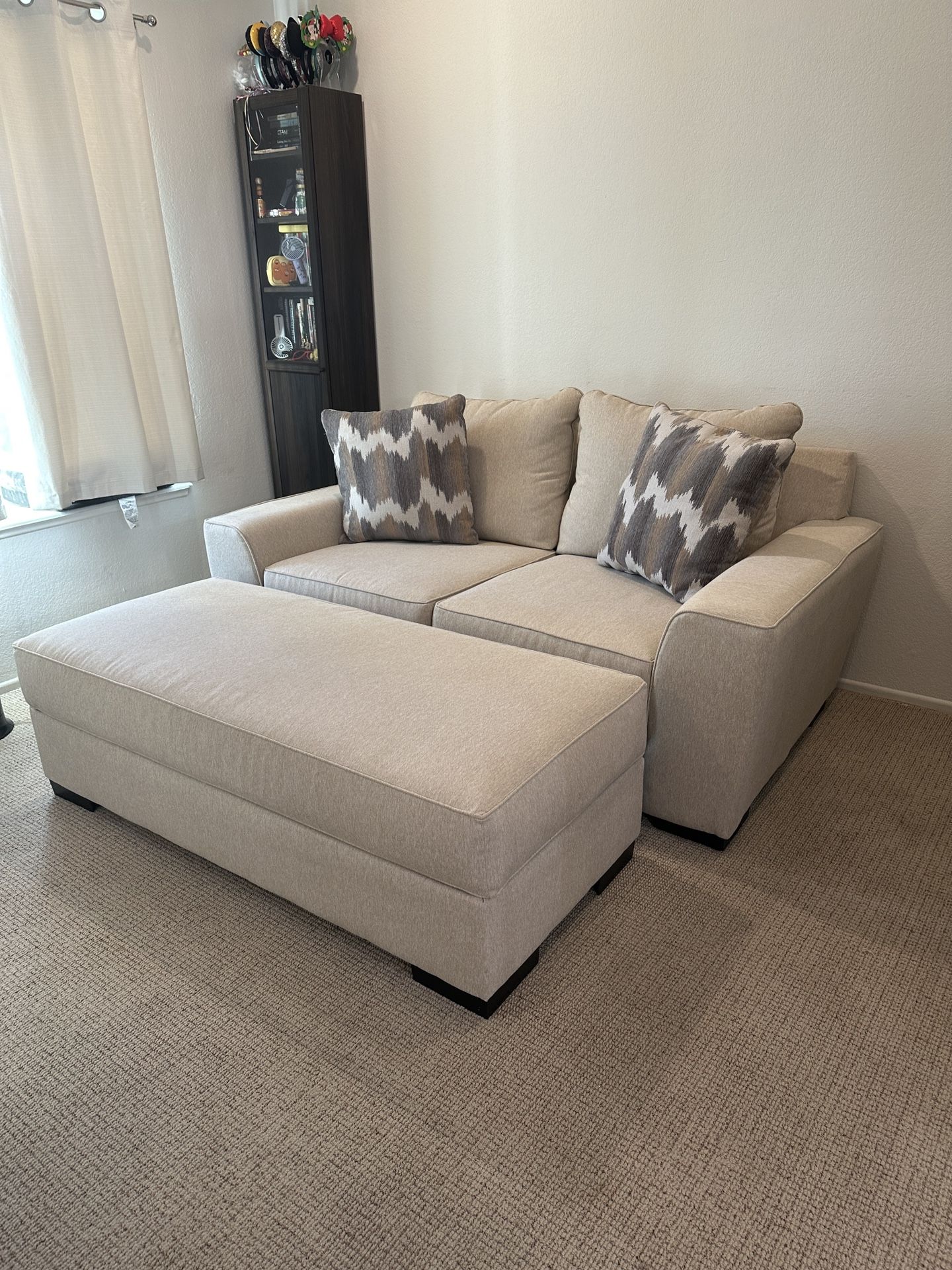Like New Two Seat Love Seat Couch With Ottoman Included