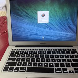 MacBook Air With The Charger 
