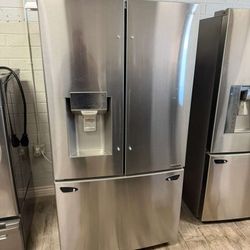 LG stainless steel French door fridge with warranty handles inside