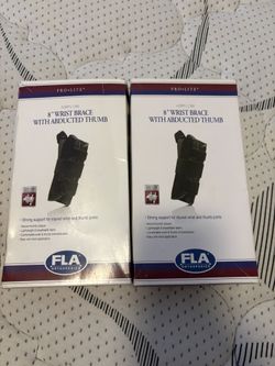 Wrist brace s/m l/xl 2 boxes black color left and right hand