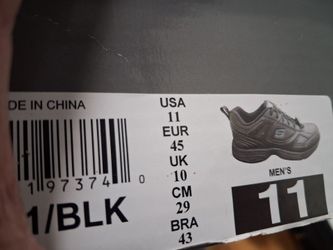 Skechers Work Men's Dighton Shoes in black, color code 1/BLK.The label indicates a US Men's size 11 (EUR 45, UK 10).