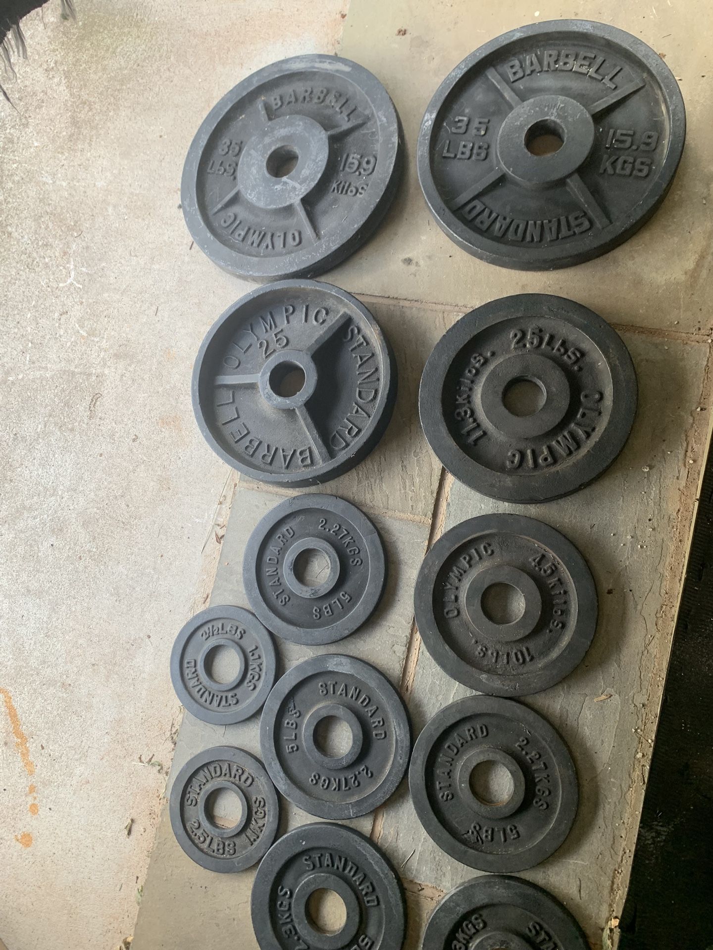 160 Lbs Olympic Weights Plates And 45 Lbs Barbell