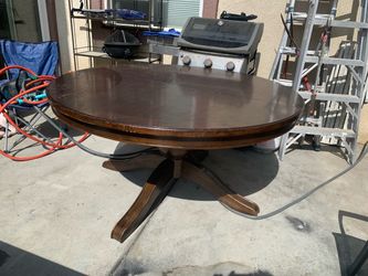 Oval Wood Pedestal Dining Table with Leaf