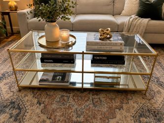 Glass and gold coffee table