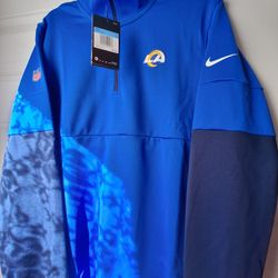 Nike Los Angeles Rams Sideline Dri-FIT Half-Zip Pullover. 