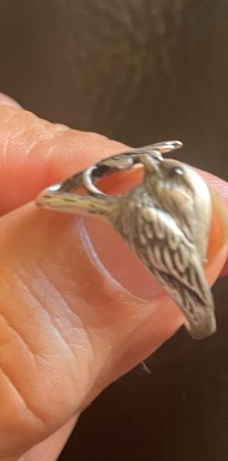 Bird with maple leaf ring