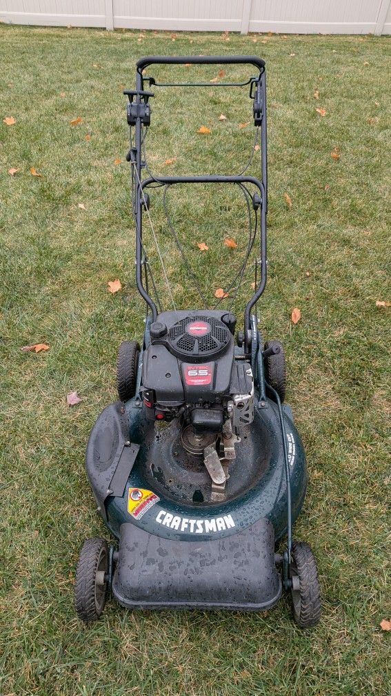 Lawnmower Craftsman with Briggs and Stratton Engine. 26" wide.
$200 OBO