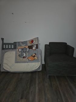 Free crib, grey frame and  mattress.