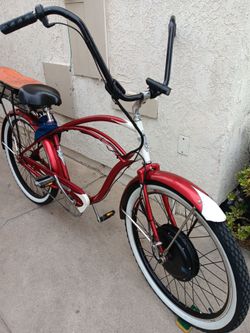 ELECTRA DELIXE CRUISER WITH A  EBIKE  FRONT W EHEEL KIT 1000WATTS 48 VOLTS  CLEAN NEW TITES NEW KIT COMES WITH CHARGER CANDY APPLE RED PAINTTALL BARS,