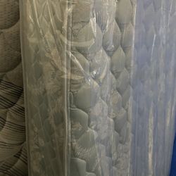 Queen Mattress 150. Like New Condition In Plastic.