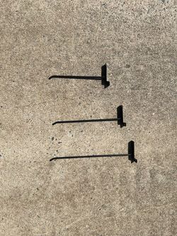 Slot wall pegs