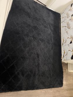 Black fluffy rug