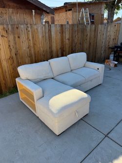 Free Delivery! Cream Colored Sectional Couch with storage and Bed