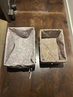 Two  baskets recovered with fabric