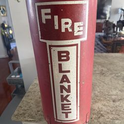 Vintage Fire Blanket Canister with Original Blanket – Wall Mountable    Circa 1950s vintage fire blanket canister complete with the original wool fire