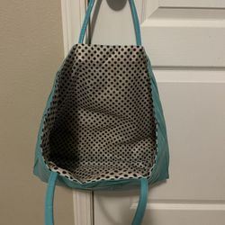 Bag with polka dots inside. Pre-Owned. teal color  Sp-Bolsa-Color Azulado