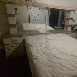 Free CalKing Bed Frame with Mirrored Headboard and Storage