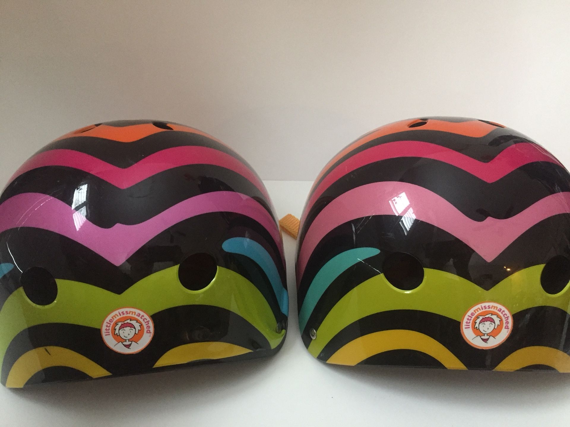 Little miss matched rainbow zebra striped bike helmets