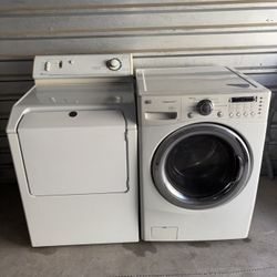 White LG Washer And Maytag Electric Dryer