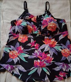 2 lightly used size 24 bathing suits.