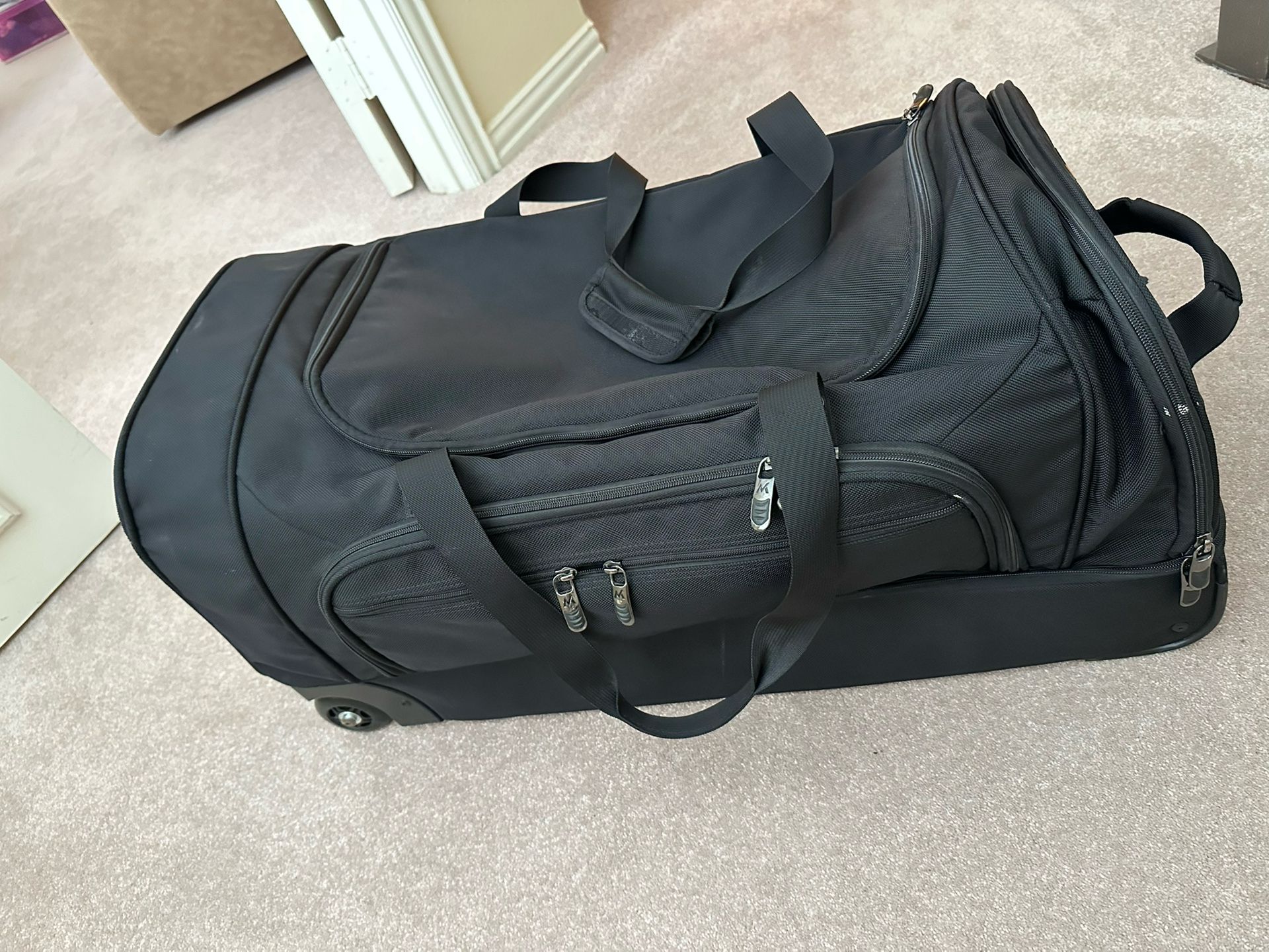Black Rolling duffel bag