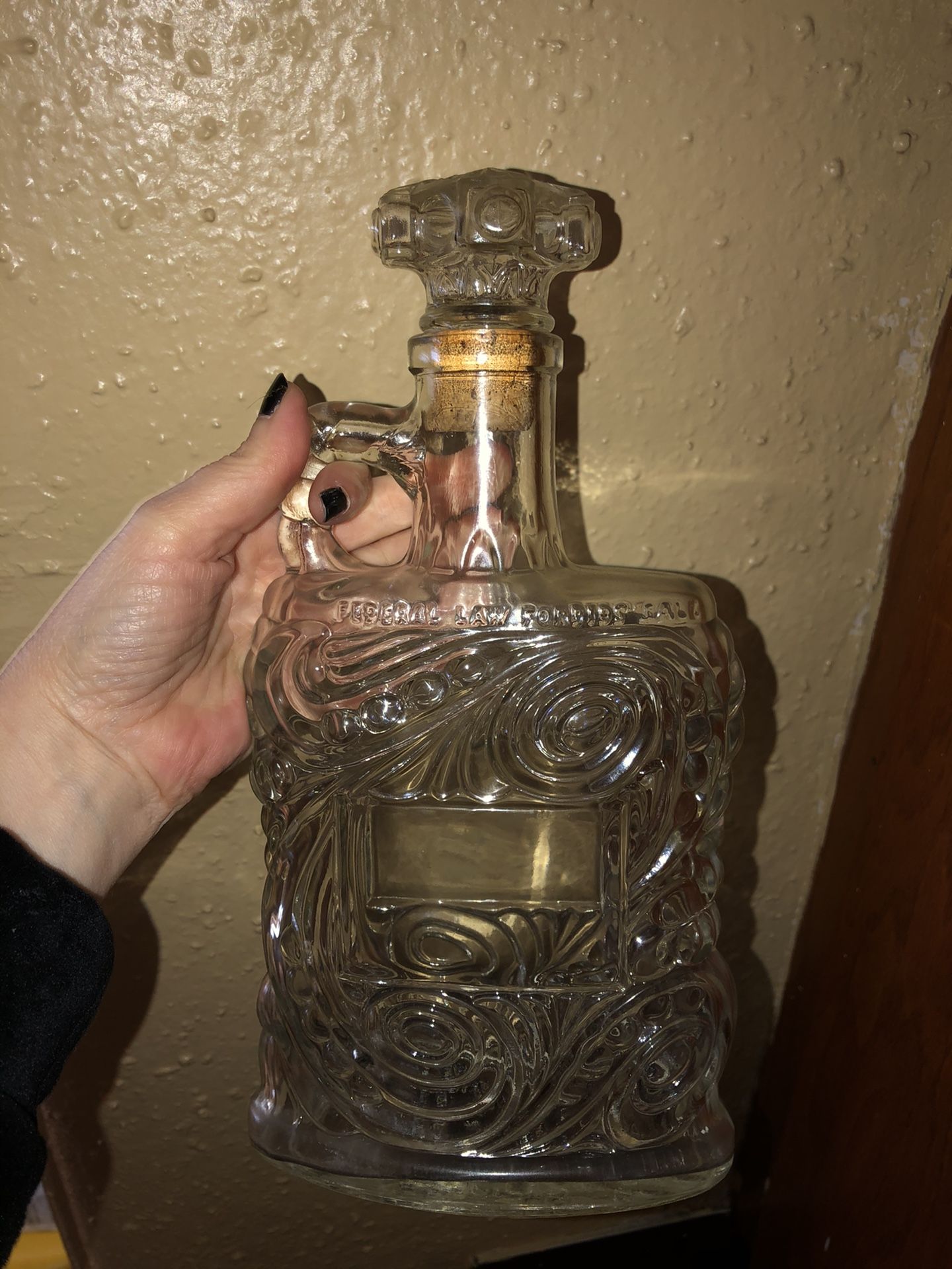 Antique glass decanter bottle with lid
