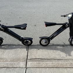 Two Electric Sit Down Foldable Scooters - Uber Scooter Plus & eMove