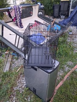 small metal dog cage used twice