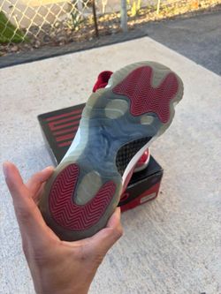 Air Jordan 11 Red and White Sneakers