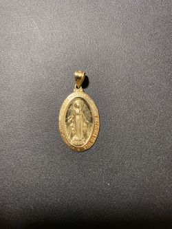 10k real solid gold pendant 1.25” and 3.2gr