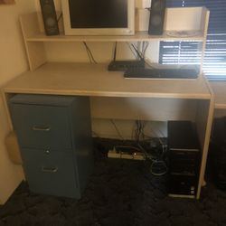 Light colored wood desk and table