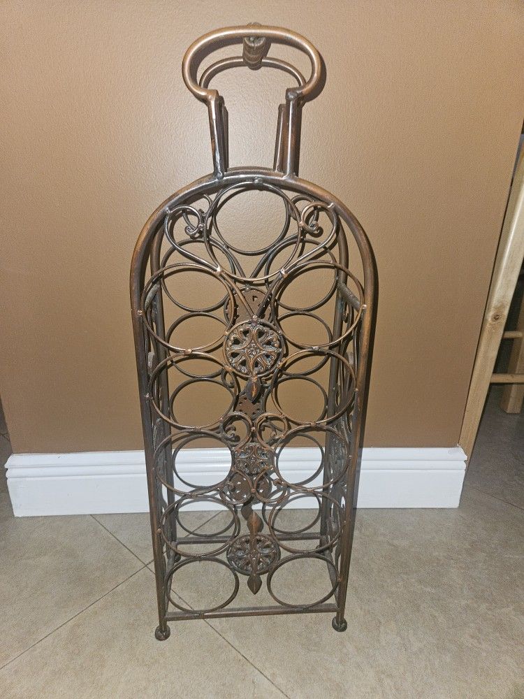 WINE RACK. 11 BOTTLE CAPACITY.  30 INCHES TALL BY 10 INCHES WIDE. Classy artistic Wine rack