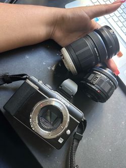Olympus Mirrorless Camera Body with Two Lenses