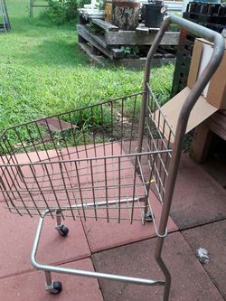 Vintage very small child's shopping cart
